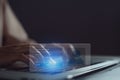 Woman hand presses keyboard on laptop to fill in email or phone number and password to access application through virtual screen Royalty Free Stock Photo