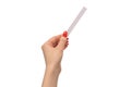 Woman hand with red nails with test strips for the perfume, isolated on a white background Royalty Free Stock Photo