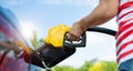 hand refilling the car with fuel Royalty Free Stock Photo