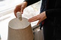 Woman hand replacing light bulb for energy saving one. Energy efficiency at home Royalty Free Stock Photo