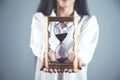 Woman hand sand clock Royalty Free Stock Photo