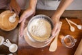 Woman Hand Sifting Bread Flour Before the Process of Kneading Dough