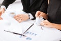 Woman hand signing contract paper