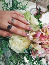 Woman hand silver metallic manicure gel nail polish swatch beauty fashion flower romantic photo Royalty Free Stock Photo