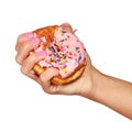 Woman Hand Squeezing Donut with Sprinkles isolated