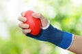 Woman hand squeezing a stress balls Royalty Free Stock Photo