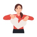 woman hand tearing apart a paper heart. broken heart and sad emotionally