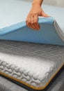 Woman hand testing mattress Royalty Free Stock Photo
