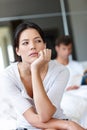 Woman, hand and thinking in bedroom with stress for breakup, dating problems and tension. Female person, thoughtful and Royalty Free Stock Photo