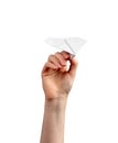 Woman hand throwing origami plane isolated on white background. Handmade flying paper construction Royalty Free Stock Photo