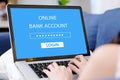 Woman hand tying laptop computer with online bank account password login on screen at home, online baking cyber security concept Royalty Free Stock Photo