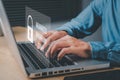 Woman hand typing on keyboard with login and password on screen display Royalty Free Stock Photo