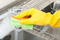 Woman hand wiping the sink tap Royalty Free Stock Photo