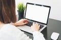 Woman hand working laptop on desk in office. can be used on ad.