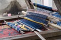 Woman hand working at loom close up Royalty Free Stock Photo