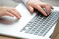 Woman hand working on a notebook using touchpad Royalty Free Stock Photo