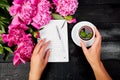 Woman hand writing diary, or letter, note with cup of coffee Royalty Free Stock Photo