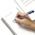 Woman hand writing with pen on notebook Royalty Free Stock Photo