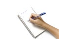 Woman hand writing with pen on notebook Royalty Free Stock Photo