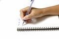 Woman hand writing with pen on notebook Royalty Free Stock Photo