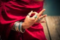 Woman hand in yoga symbolic gesture mudra