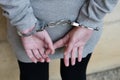 Woman in handcuffs behind her back Royalty Free Stock Photo