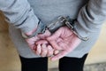 Woman in handcuffs behind her back Royalty Free Stock Photo