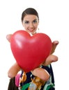 Woman handing a big red heart