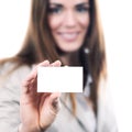 Woman handing a blank business card Royalty Free Stock Photo