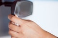 Woman hands adjusting rear view mirror in the car Royalty Free Stock Photo