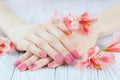 Woman hands with beautiful pink matted manicure Royalty Free Stock Photo