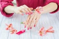 Woman hands with beautiful pink matted manicure Royalty Free Stock Photo