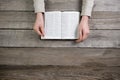 Woman hands on bible. she is reading and praying Royalty Free Stock Photo