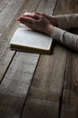 Woman hands on bible. she is reading and praying Royalty Free Stock Photo