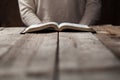 Woman hands on bible. she is reading and praying Royalty Free Stock Photo