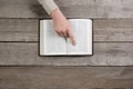 Woman hands on bible. she is reading and praying Royalty Free Stock Photo