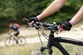 Woman hands on bicycle handle bars Royalty Free Stock Photo