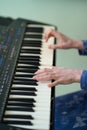 Woman hands black white piano keys synth close-up Royalty Free Stock Photo