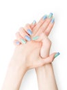 Woman hands with blue and green colored art nails polish Royalty Free Stock Photo