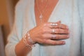 Woman hands with boho gypsy accessories rings and bracelets closeup Royalty Free Stock Photo