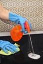 Woman Hands Cleaning A Black Induction Hob Royalty Free Stock Photo