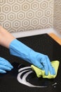 Woman Hands Cleaning A Modern Induction Hob Royalty Free Stock Photo