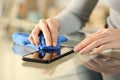 Woman hands cleaning phone screen at home Royalty Free Stock Photo