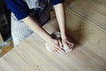 Woman hands close-up, forming crude clay in a potter`s workshop studio. Craft-work. Royalty Free Stock Photo