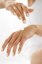 Woman Hands With Cream. Closeup Of Female Hands Applying Lotion Royalty Free Stock Photo