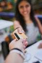 Woman, hands and credit card payment at a cafe or waiter in restaurant for transaction or customer ready for purchase Royalty Free Stock Photo