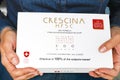 Woman hands with Crescina HFSC Re-Growth Anti-Hair Loss Complete