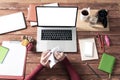 Woman hands crumpling paper ball at desk