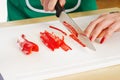 Woman hands cutting julienne pepper