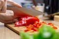 Woman hands cutting vegetables in the kitchen. Royalty Free Stock Photo